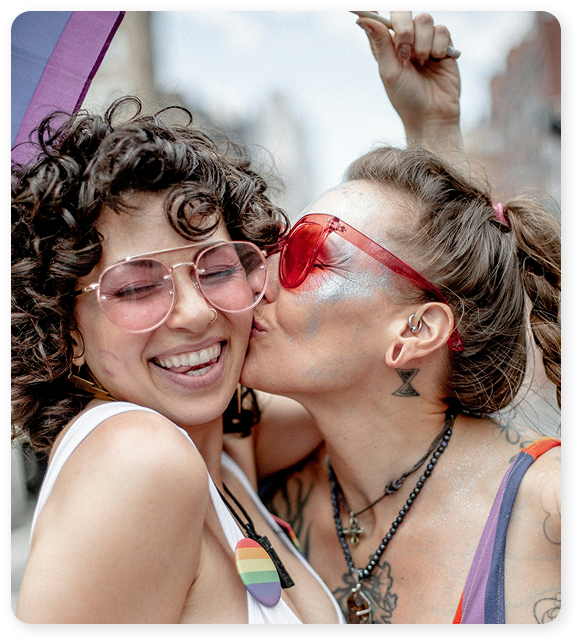photo of two young women celebrating