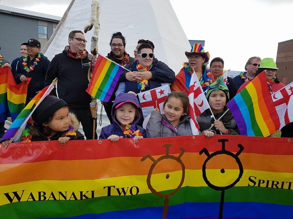 a group of supporters with flags